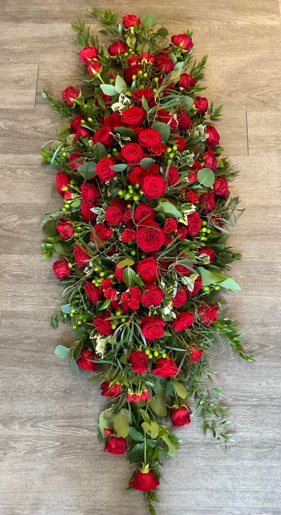 Red rose casket spray