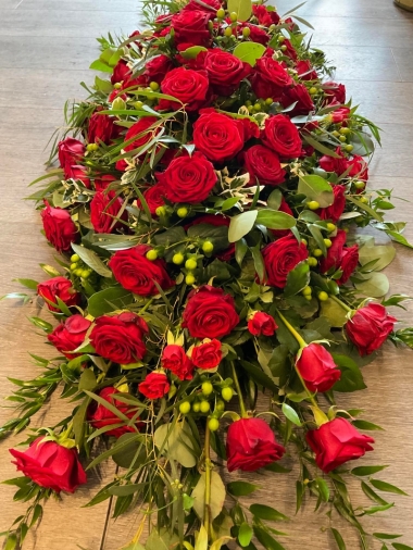 Red rose casket spray